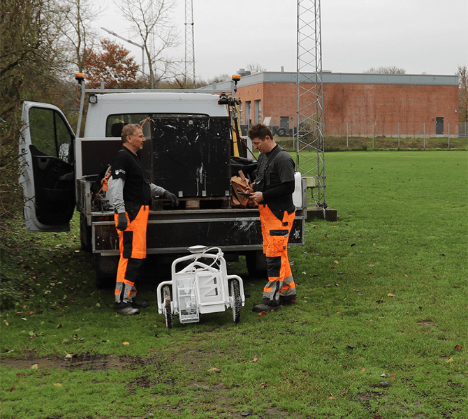 Municipal workers unloading a Pro X